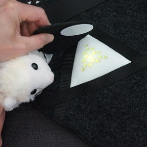 Sheep slipper sings with her sheepy voice when user activates the RFID-reader, the white glowing triangle